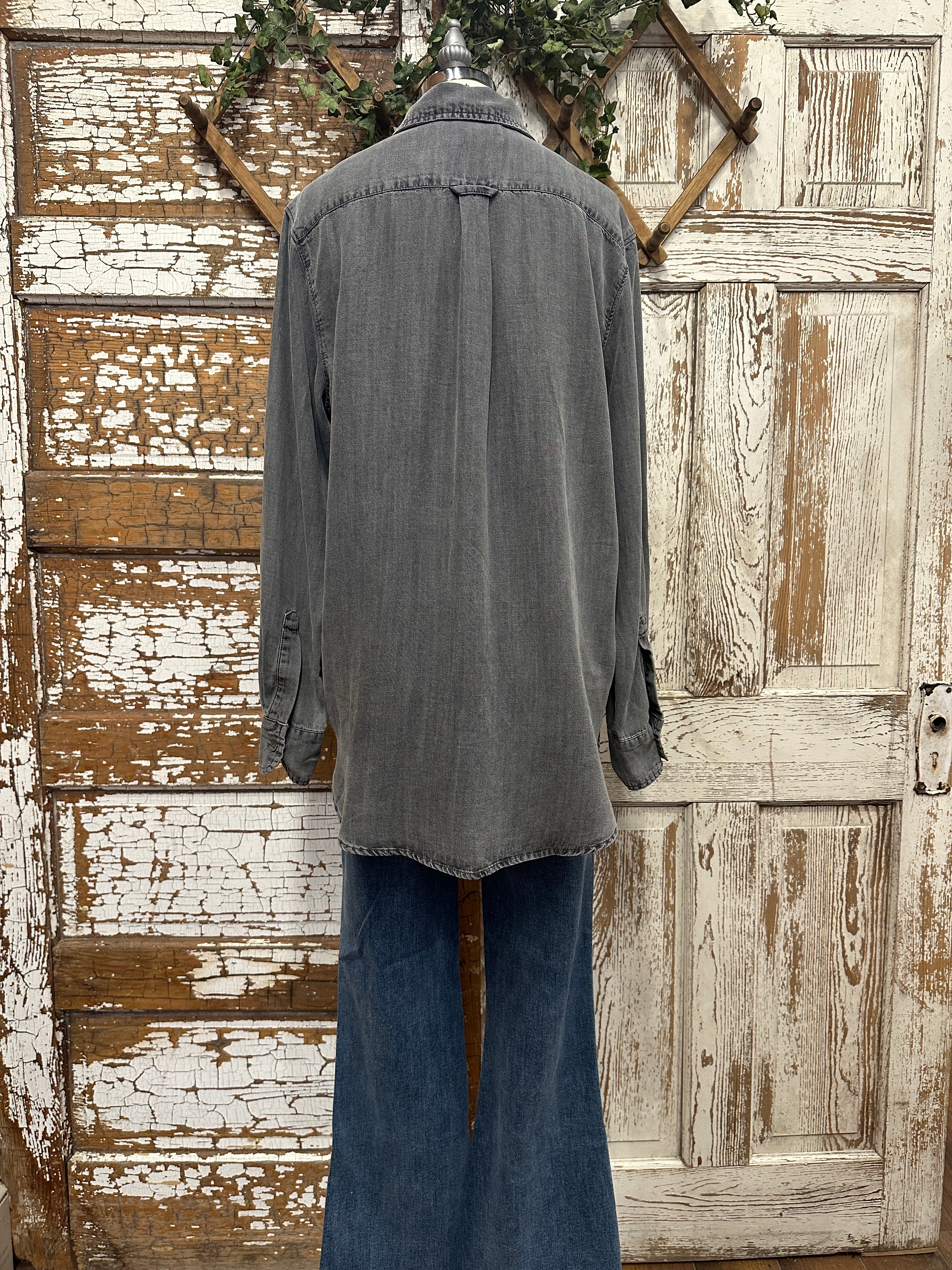 Weathered distressed button up with handmade jewelry and boutique clothing in boutiques near me