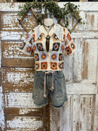 denim shorts with raw hemline