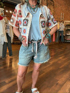 denim shorts with raw hemline