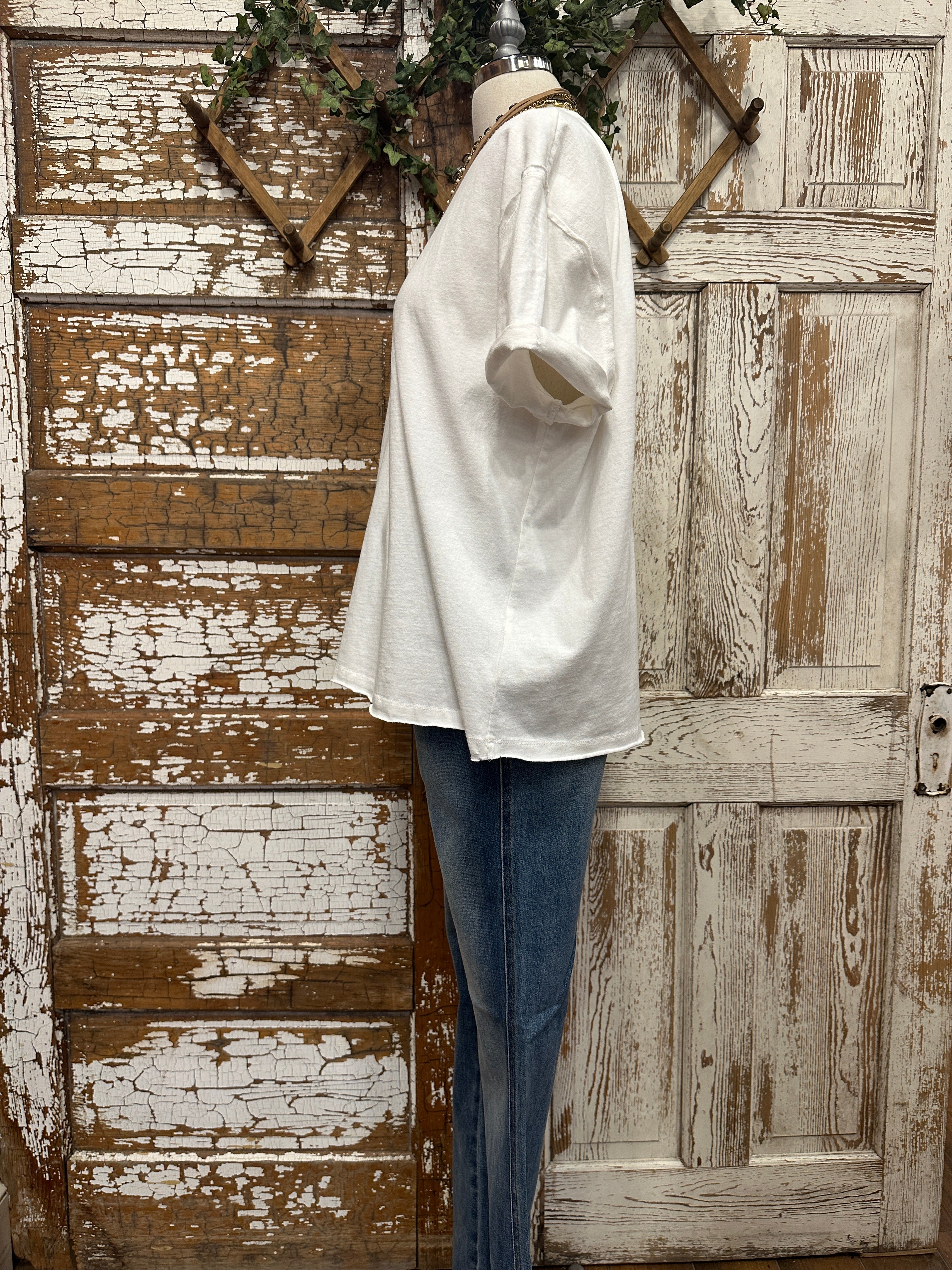 boutiques near me featuring white tee with jean pants and handmade jewelry