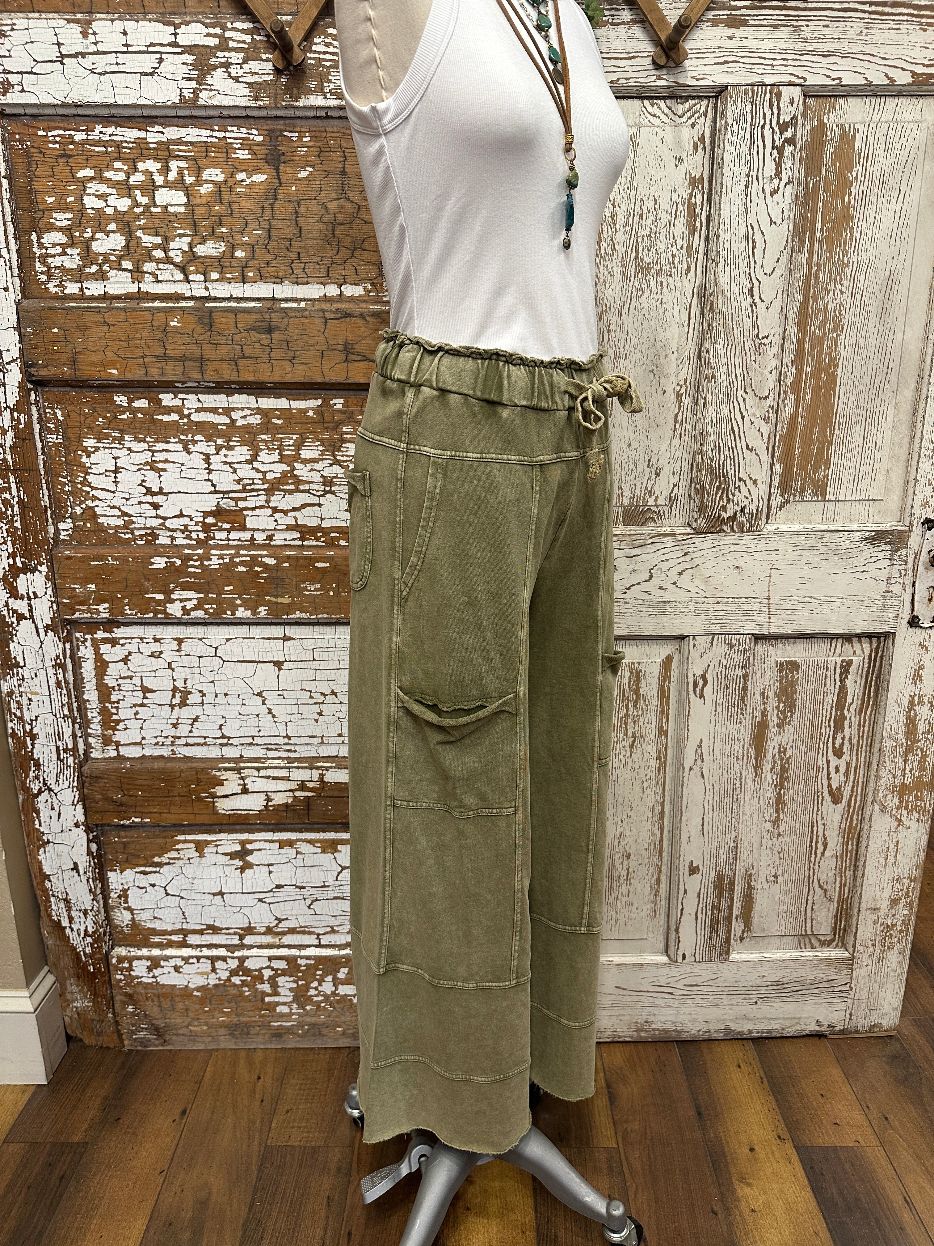 Mannequin wearing leisurewear pants and handmade jewelry in Leavenworth, KS boutique