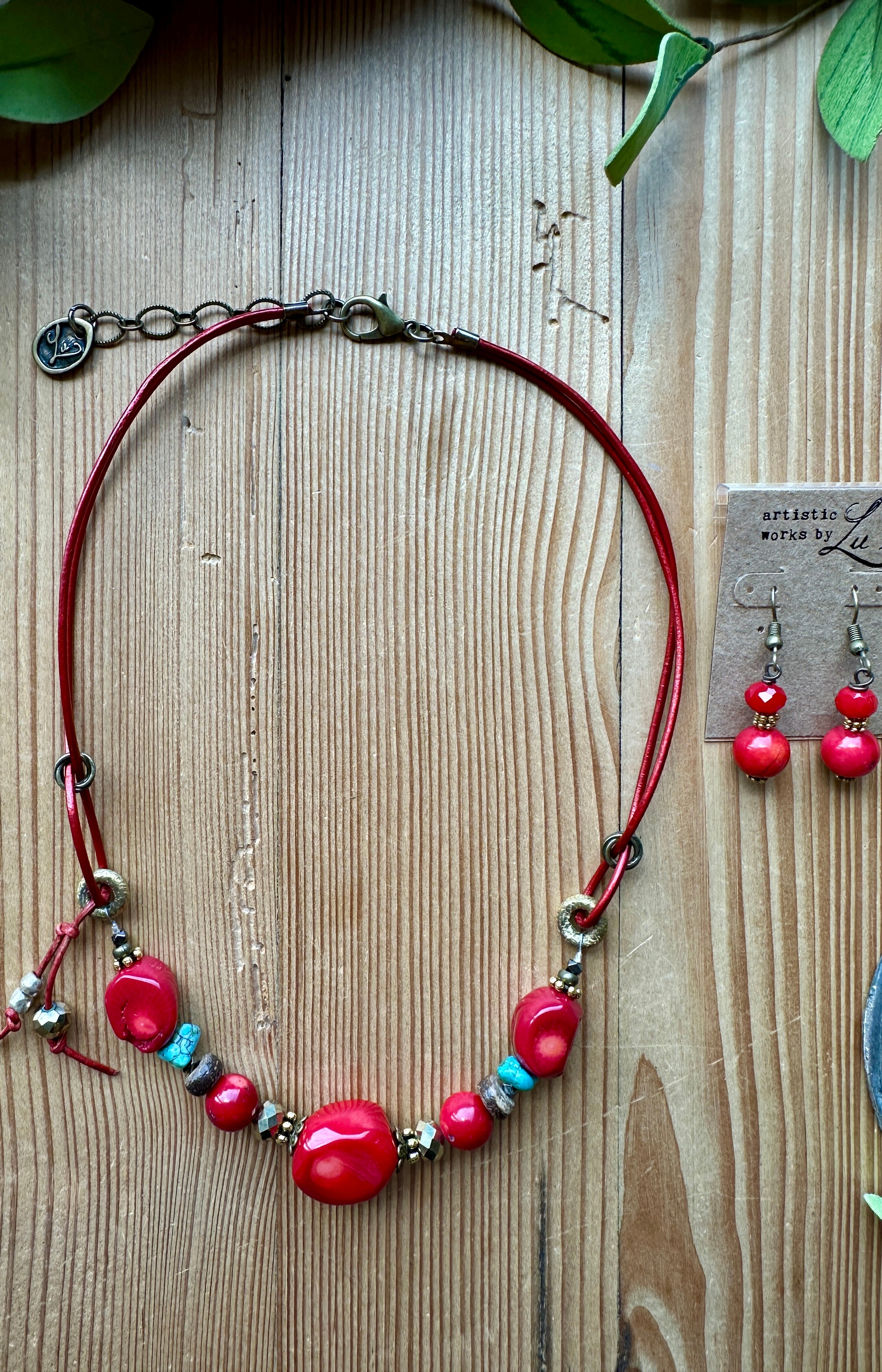Red handmade beaded earrings and necklace