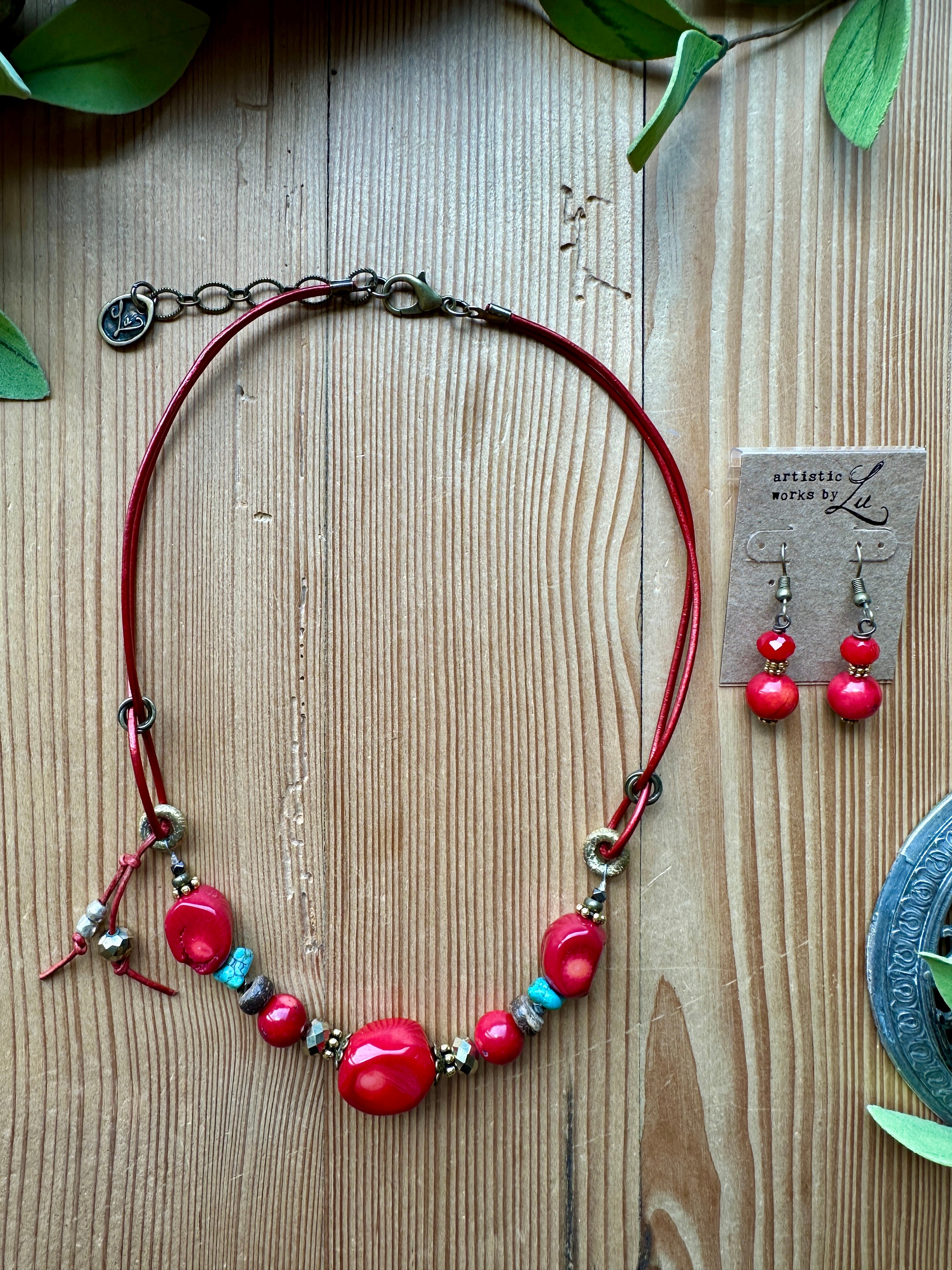 Red handmade beaded earrings and necklace