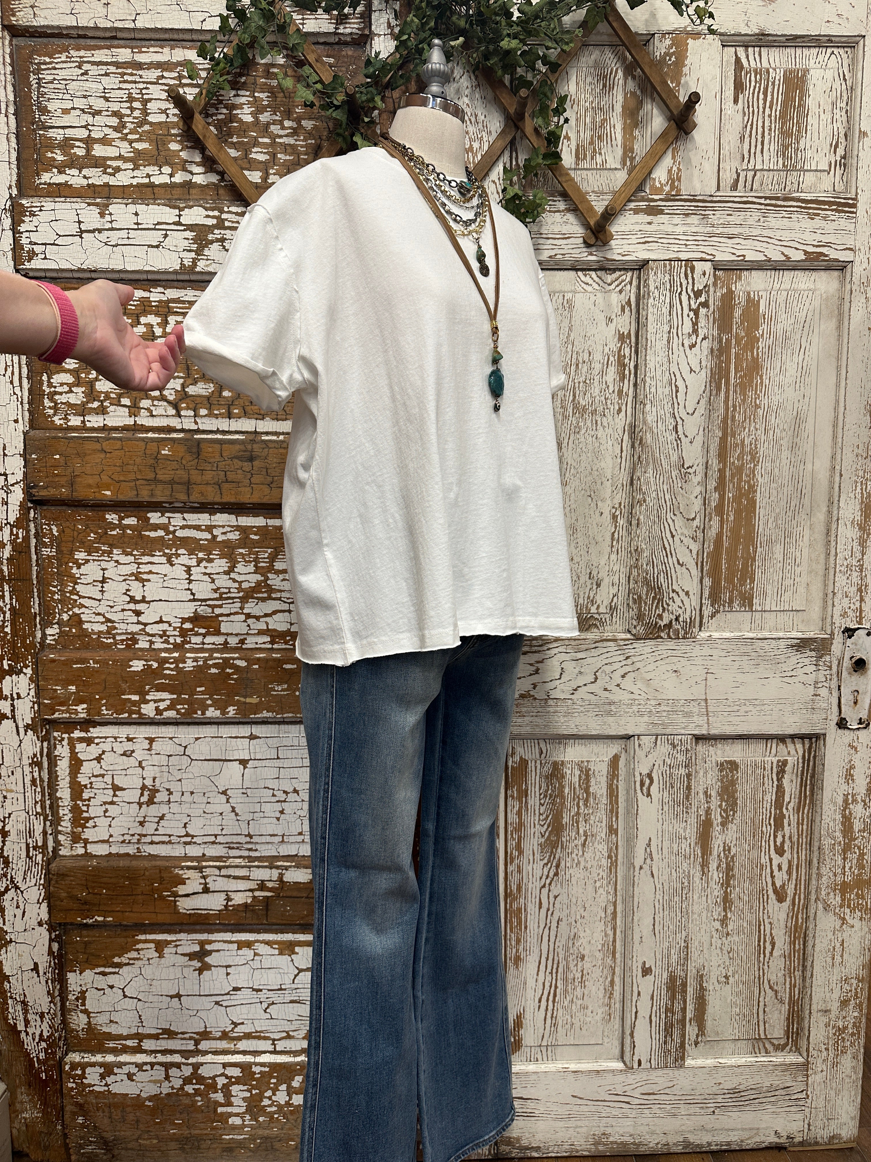 boutiques near me featuring white tee with pants and handmade jewelry