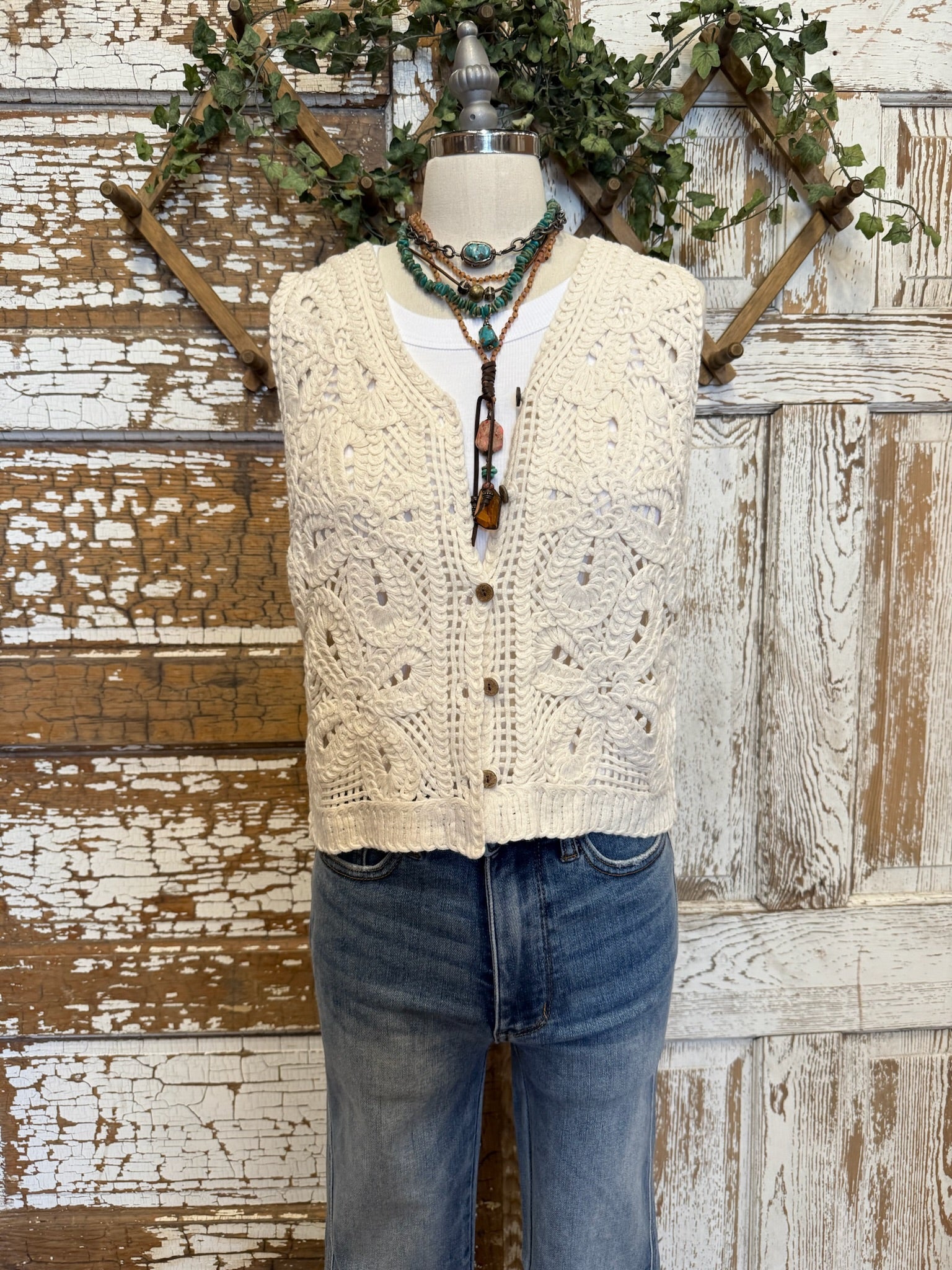 Mannequin in Leavenworth boutique store in leisurewear pants and crochet vest with handmade jewelry