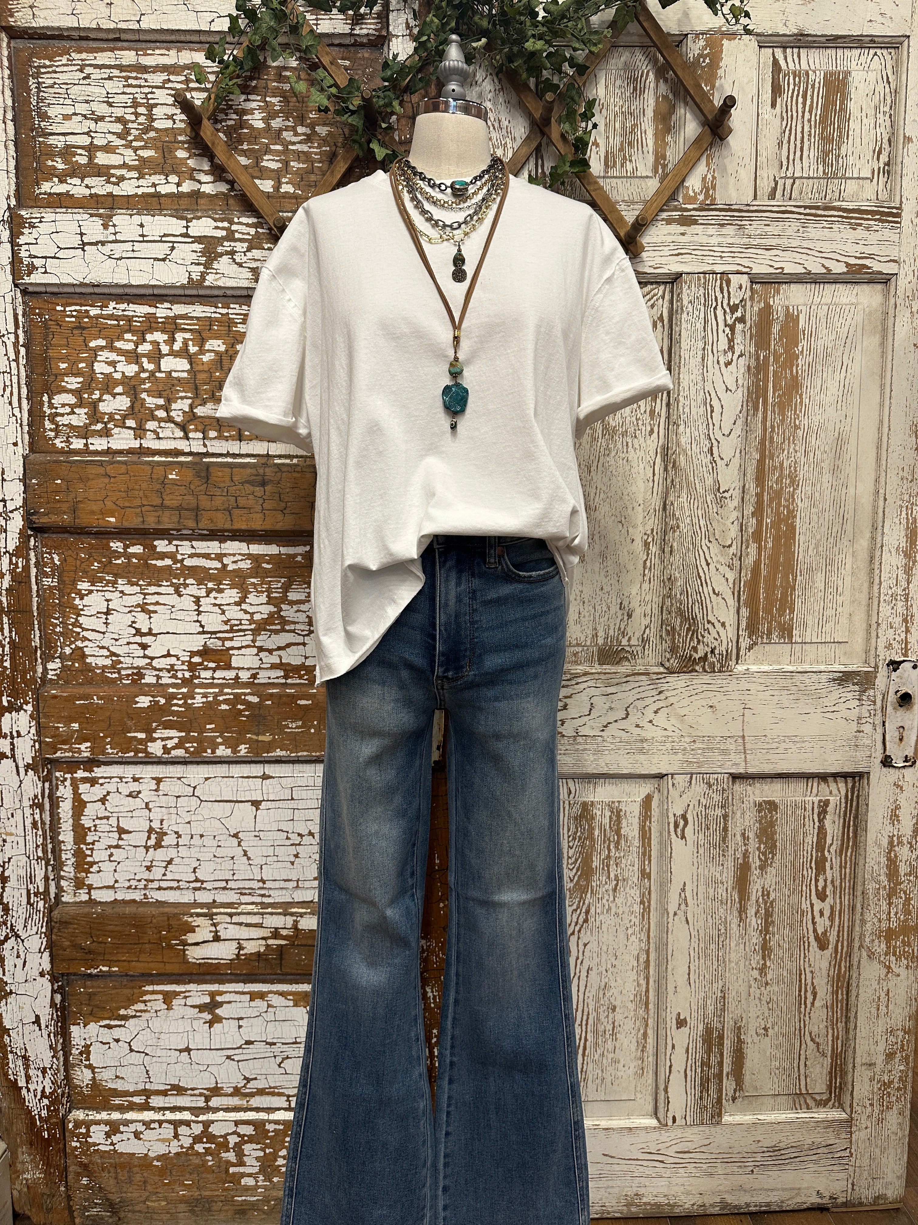 boutiques near me featuring white tee with pants and handmade jewelry