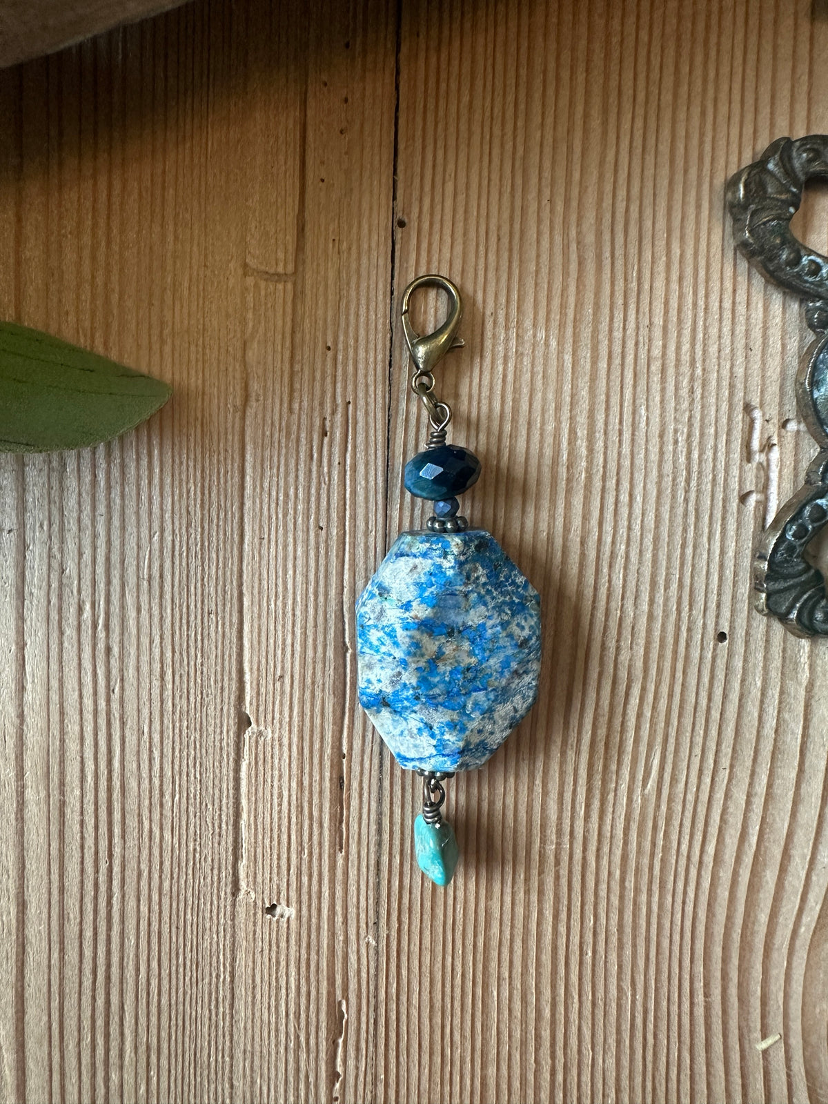 Faceted lapis lazuli pendant charm with turquoise drop