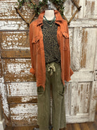 Mannequin wearing animal print in Springfield, MO boutique with handmade jewelry necklace