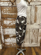 Mannequin wearing army cargo pants and white tank with handmade jewelry necklace in Leavenworth, KS boutique