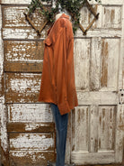 Mannequin wearing a boutique clothing jacket, white shirt and pants with handmade jewelry in Leavenworth, KS boutique