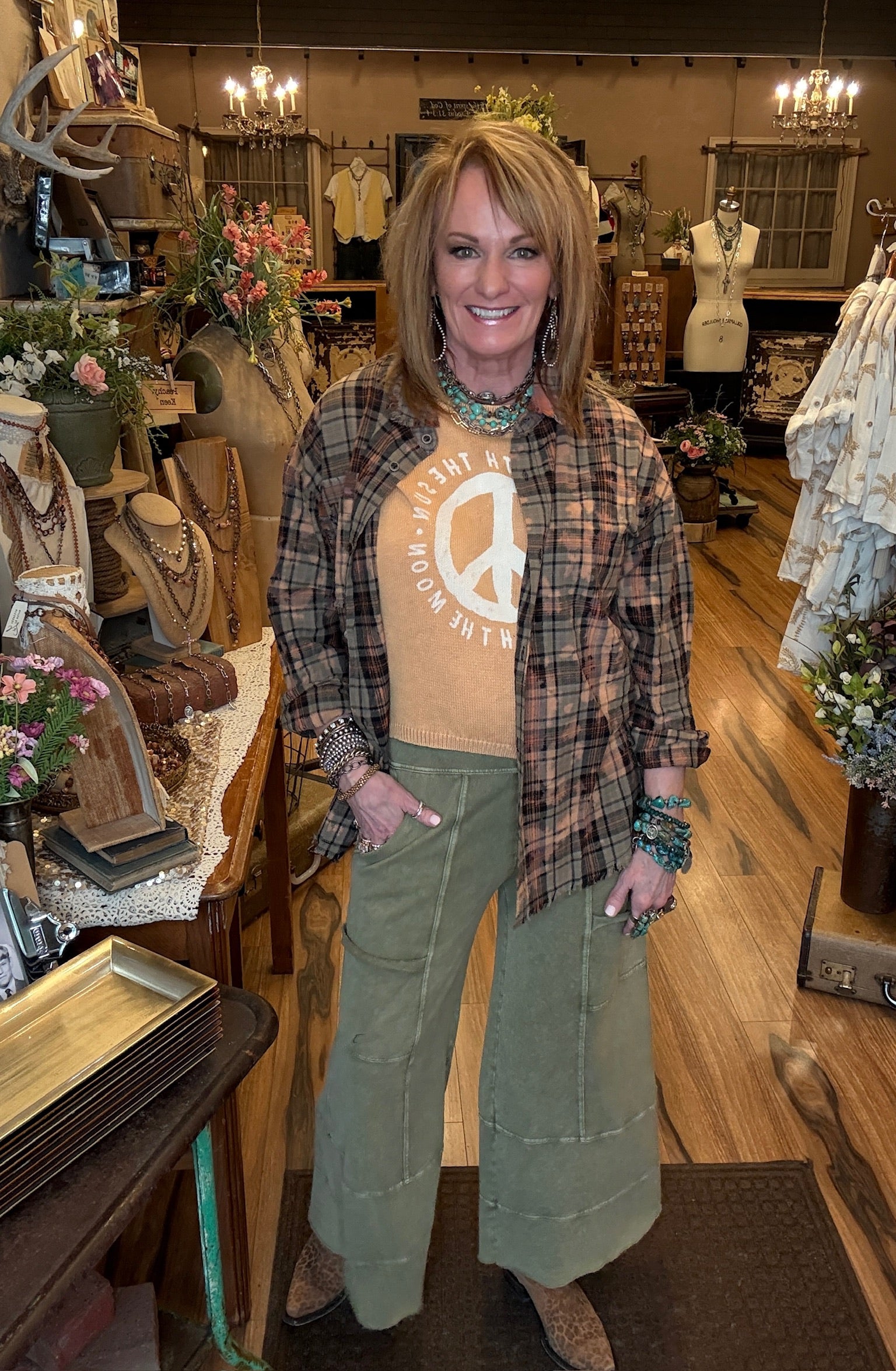 Lu standing in Leavenworth, KS boutique in new boutique clothing arrivals 