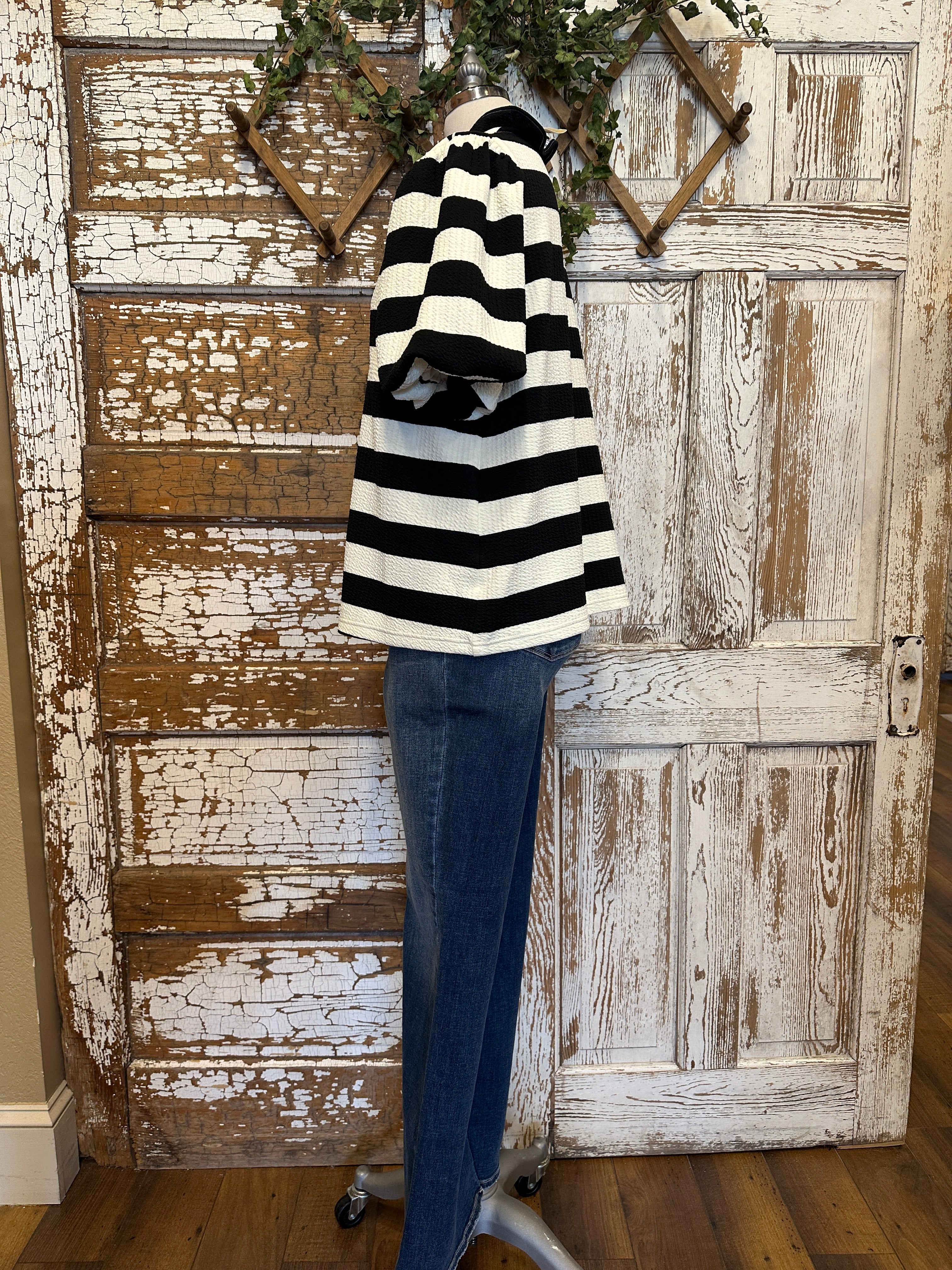 Mannequin wearing Harper Striped Knit Top-SALE item with black and white stripes and turquoise jewelry in Leavenworth, KS