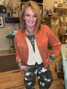 Lu standing in Leavenworth, KS boutique in new boutique clothing arrivals and handmade jewelry 