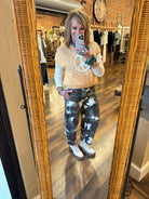 Lu standing in Leavenworth, KS boutique in new boutique clothing arrivals 