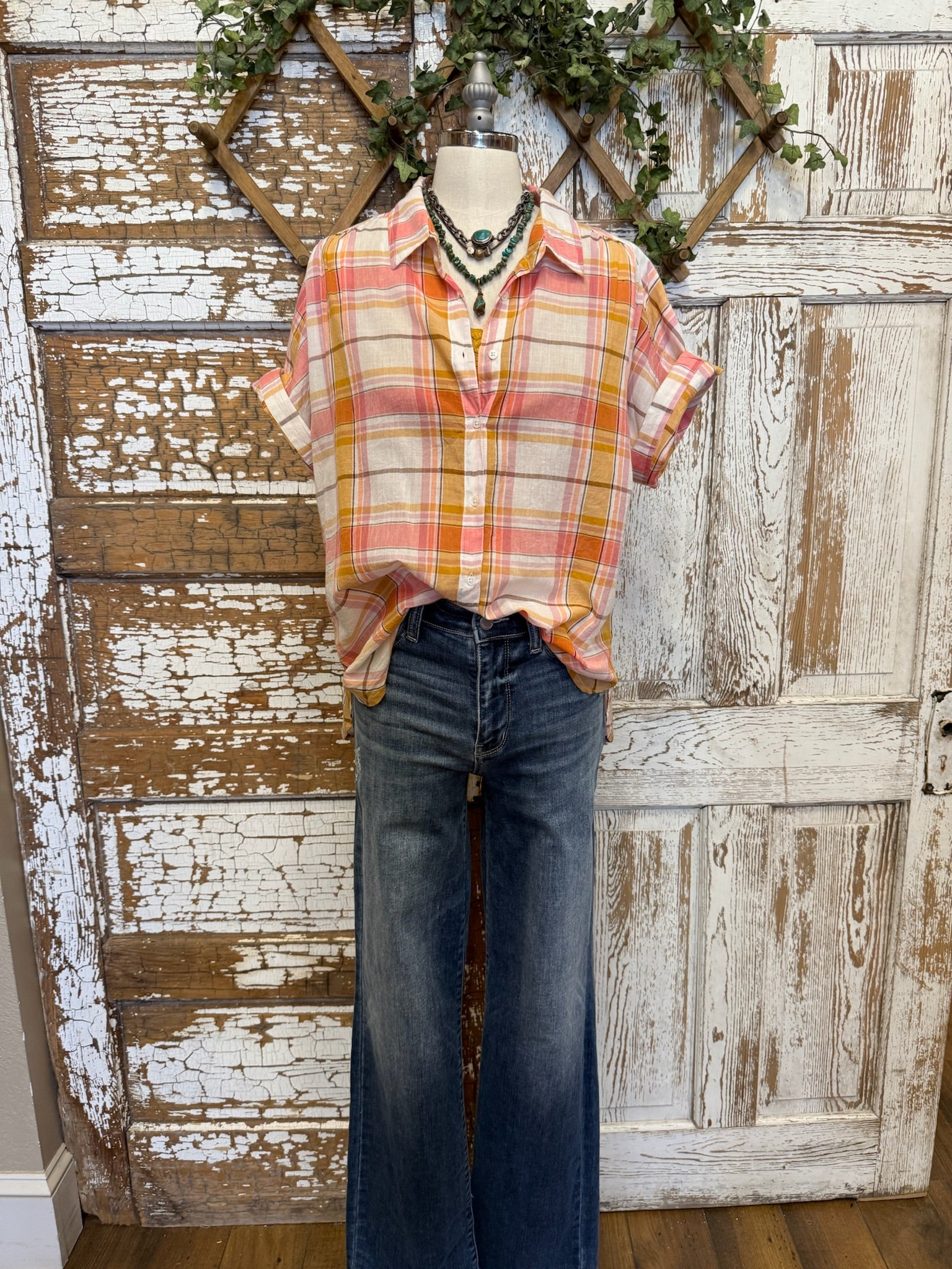 Pink and orange plaid blouse