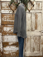 Weathered distressed button up with handmade jewelry and boutique clothing in boutiques near me