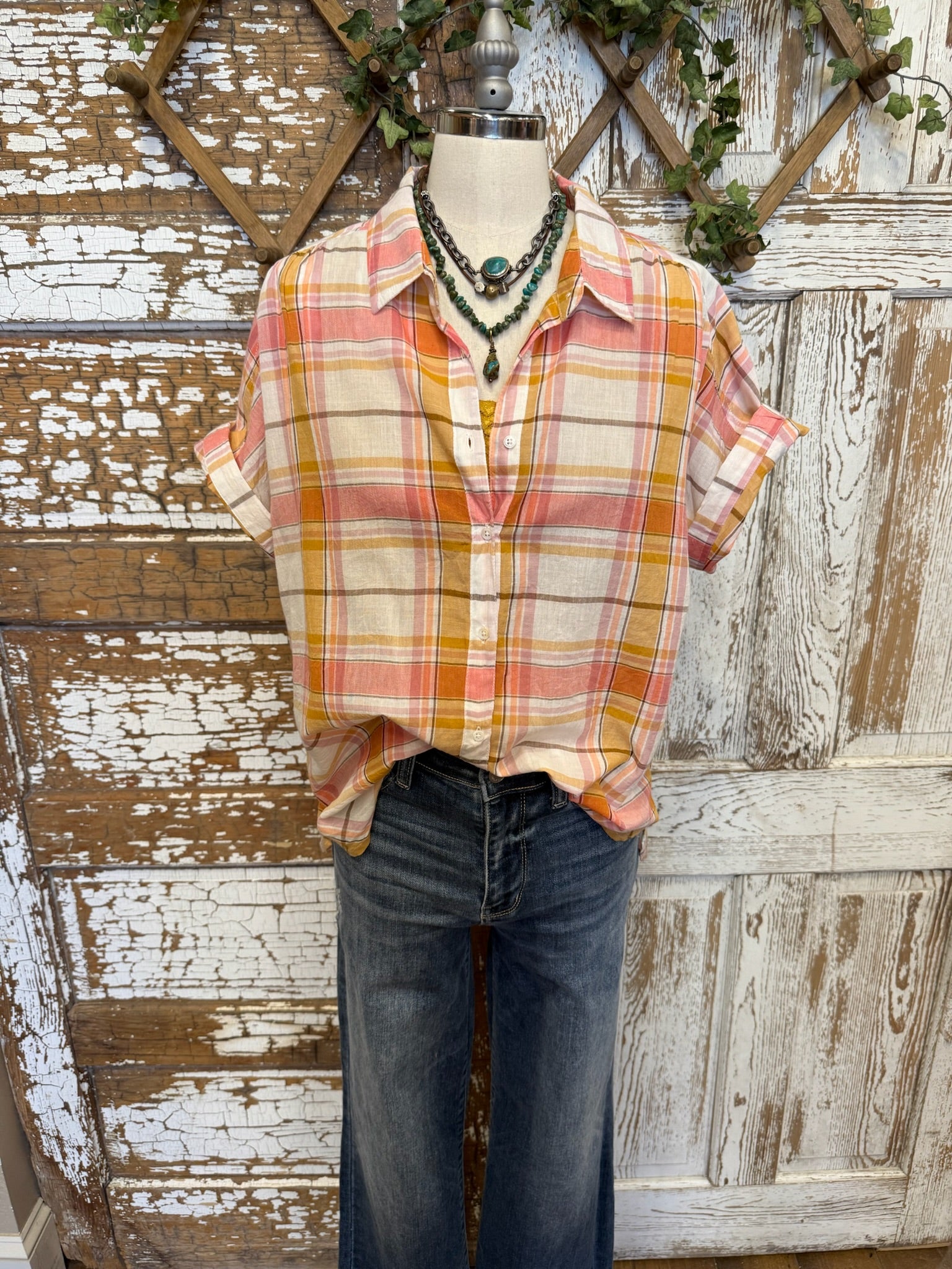 Pink and orange plaid blouse