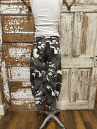 Mannequin wearing army cargo pants and white tank with handmade jewelry necklace in Leavenworth, KS boutique