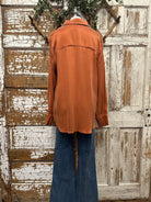 Mannequin wearing a boutique clothing jacket, white shirt and pants with handmade jewelry in Leavenworth, KS boutique
