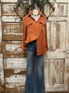 Mannequin wearing a boutique clothing jacket, white shirt and pants with handmade jewelry in Leavenworth, KS boutique