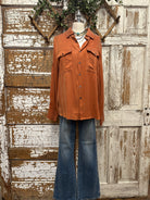 Mannequin wearing a boutique clothing jacket, white shirt and pants with handmade jewelry in Leavenworth, KS boutique
