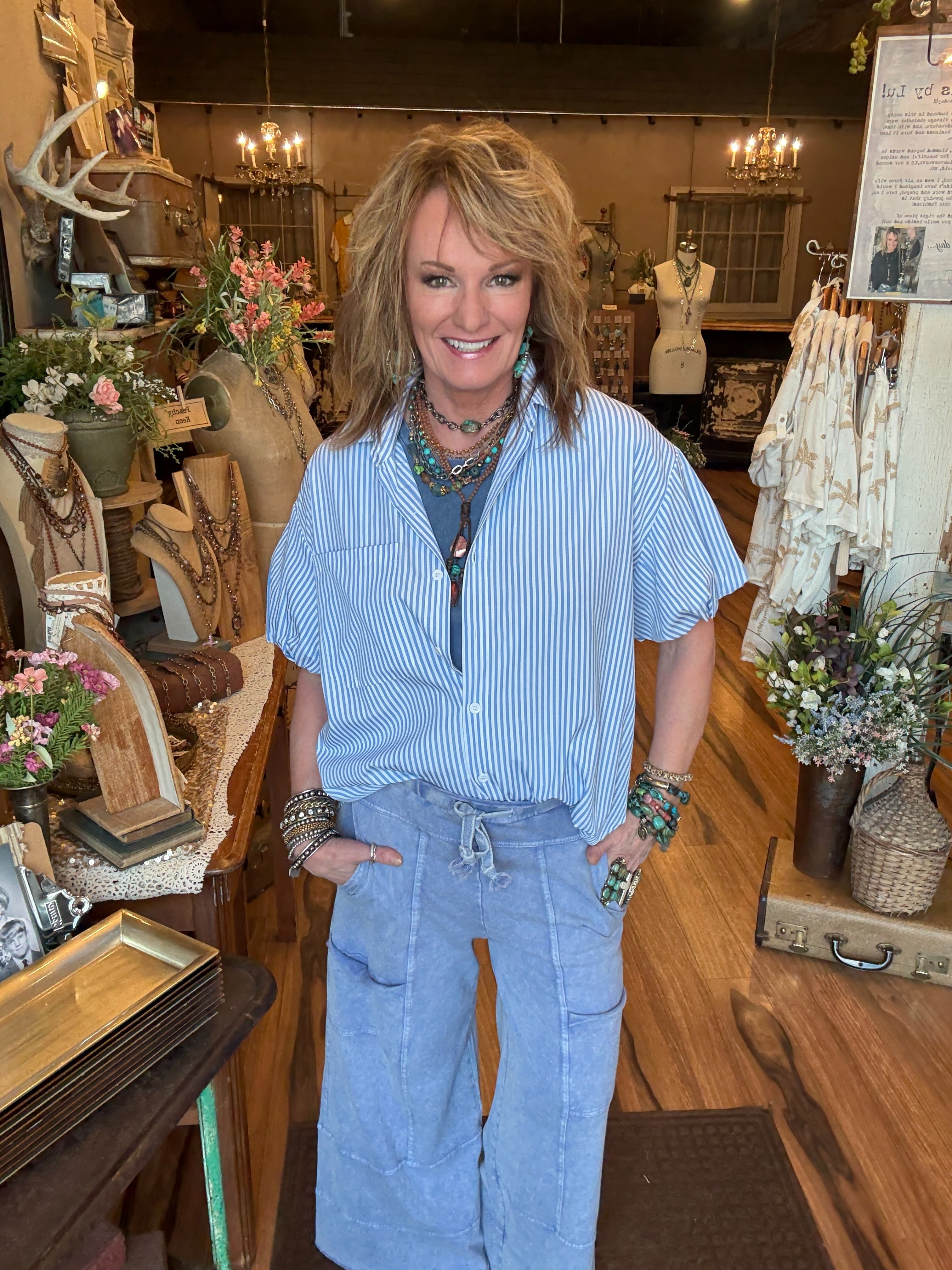 Lu  wearing leisure pants - comfortable loungewear and leisurewear for women with handmade jewelry and striped button up in Springfield MO boutique 