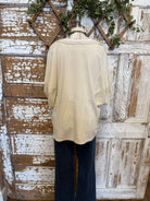 cream popover top with buttons