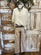 cream popover top with buttons