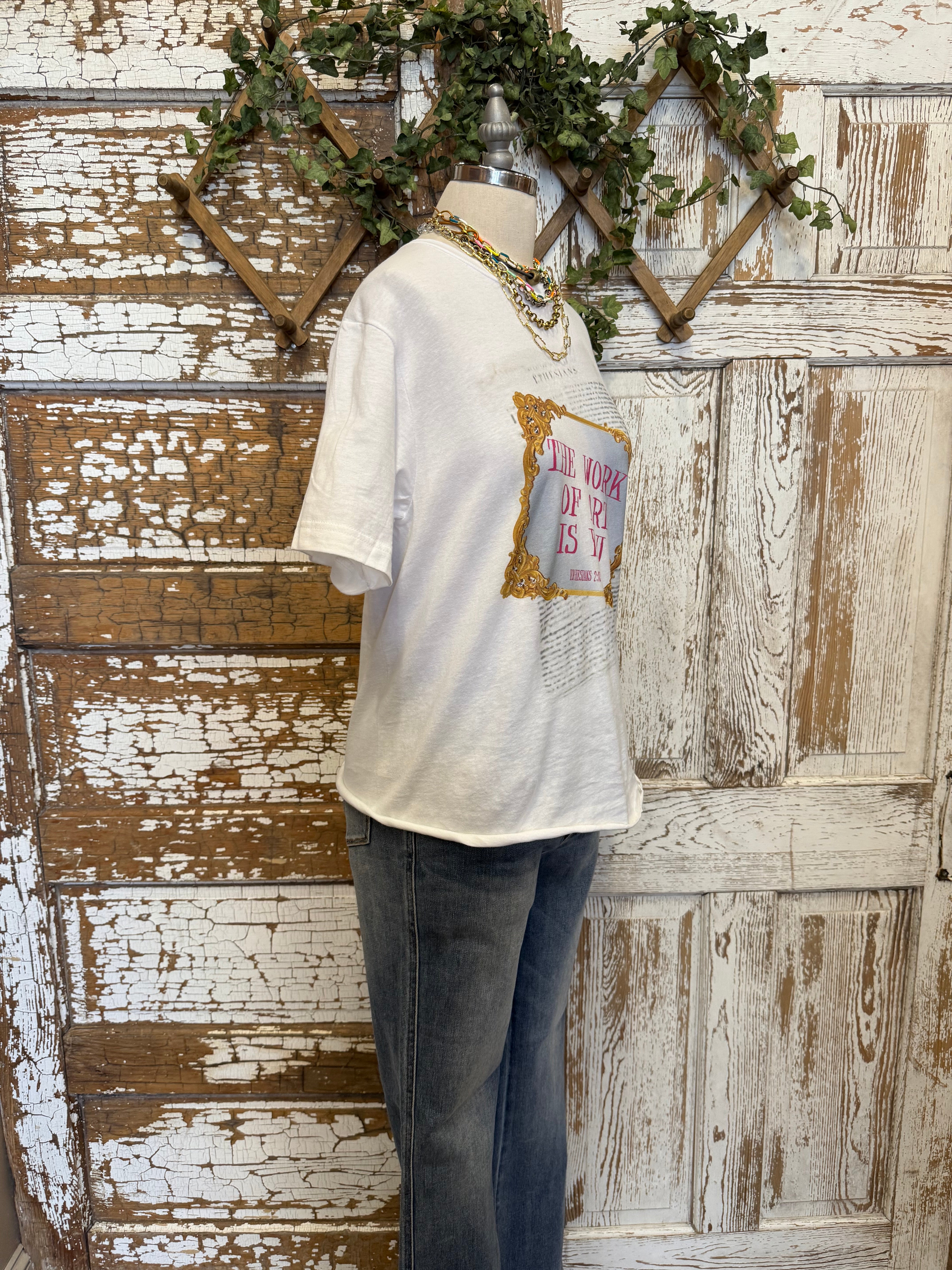 Mannequin wearing graphic tee and jeans 