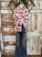 Mannequin wearing a patterned resort shirt in boutique 