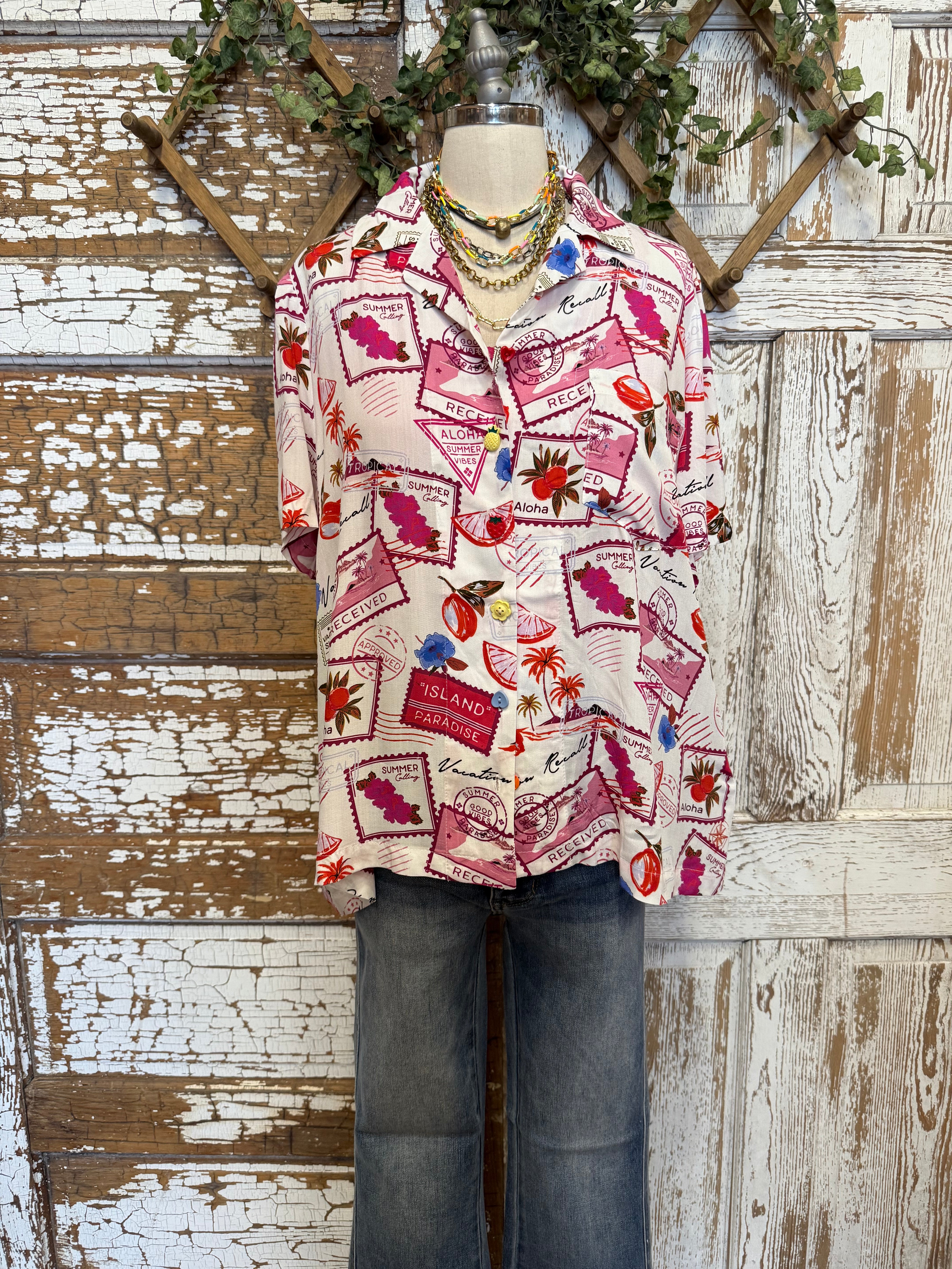 Mannequin wearing a patterned resort shirt in boutique 