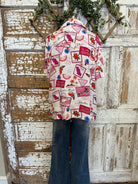 Mannequin wearing a patterned resort shirt in boutique 