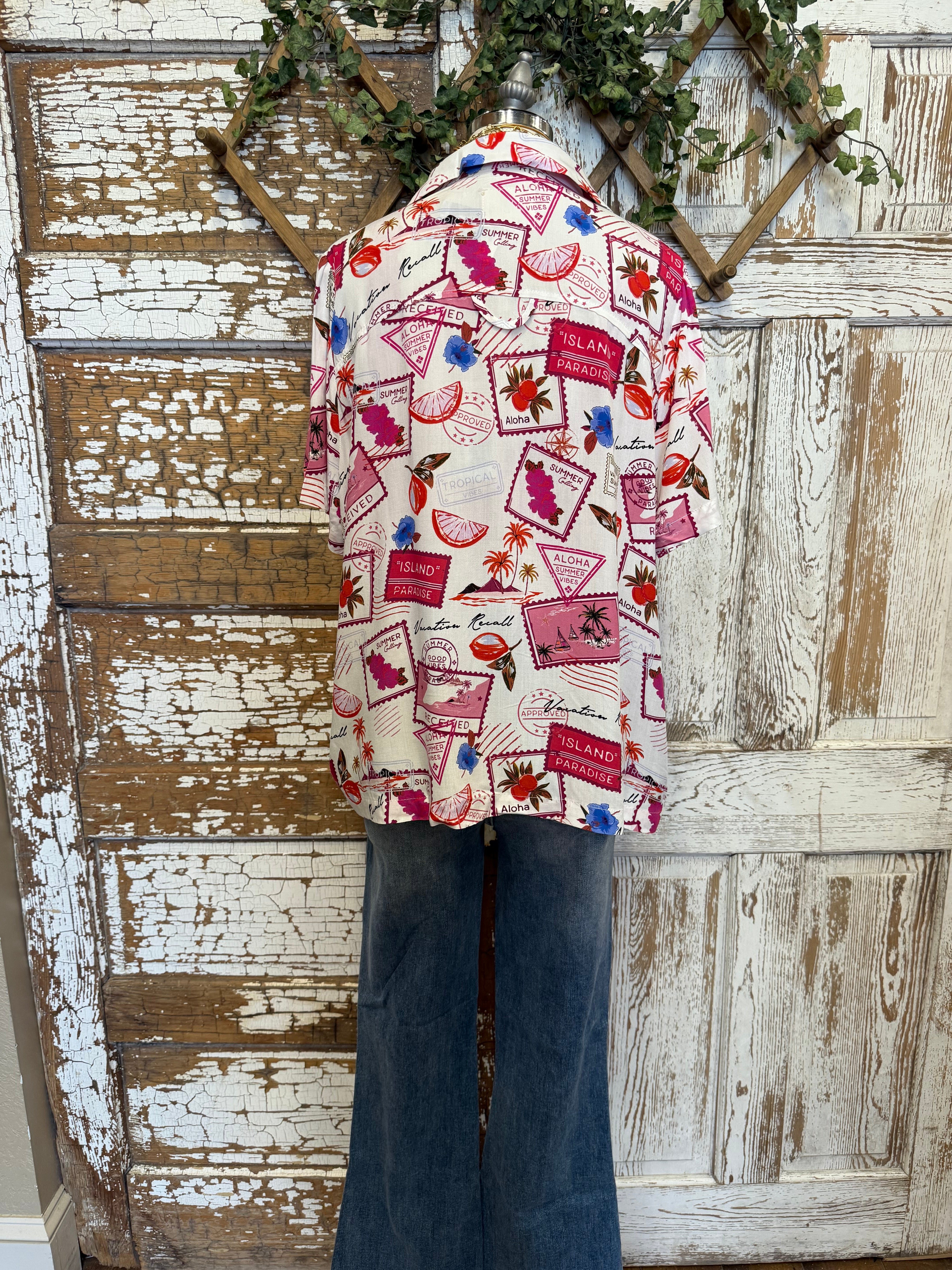 Mannequin wearing a patterned resort shirt in boutique 