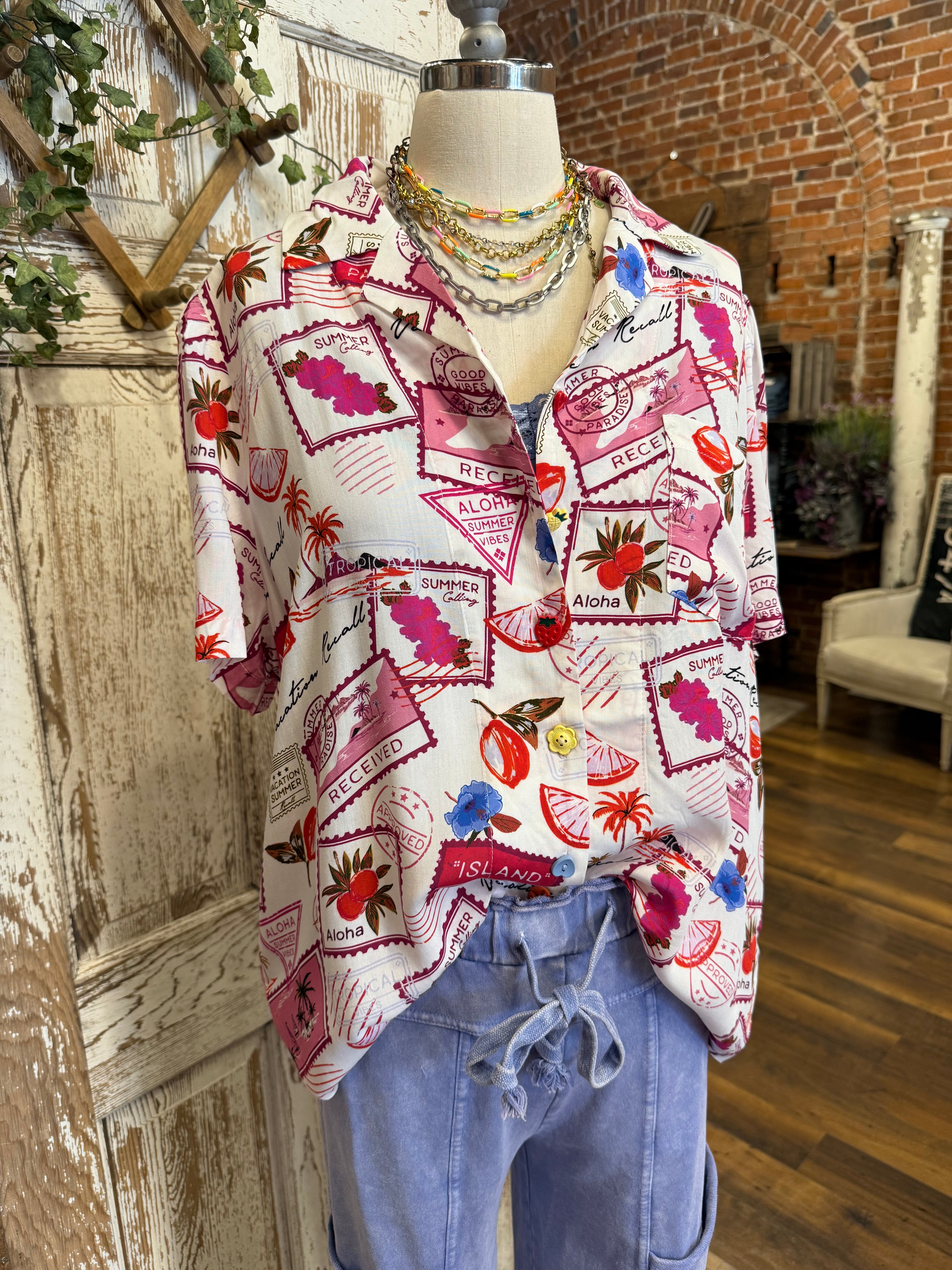 Mannequin wearing a patterned resort shirt in boutique 