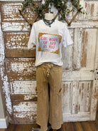 Mannequin wearing graphic tee and loungewear leisurewear pants