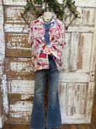 Mannequin wearing a patterned resort shirt in boutique 