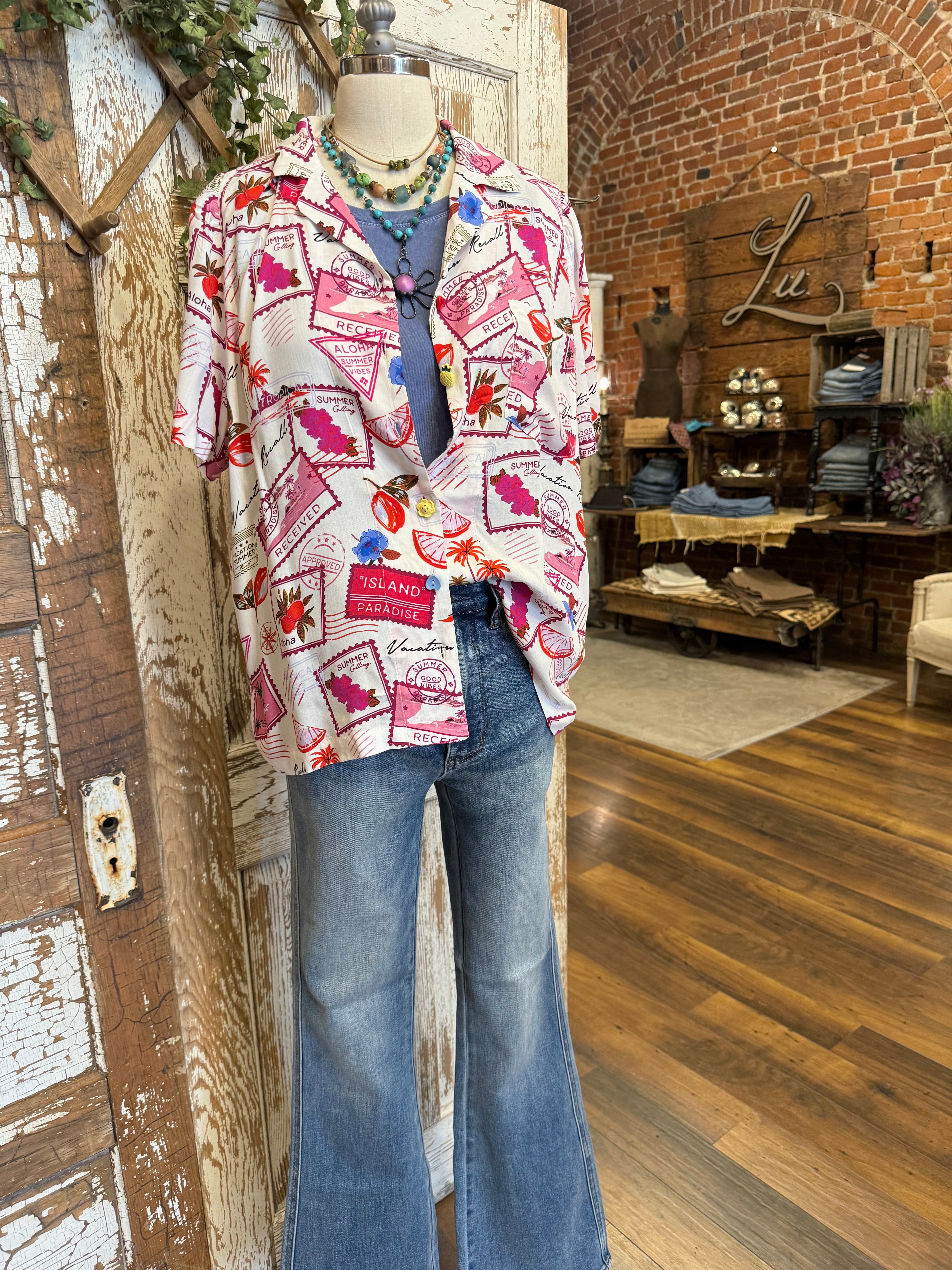 Mannequin wearing a patterned resort shirt in boutique 