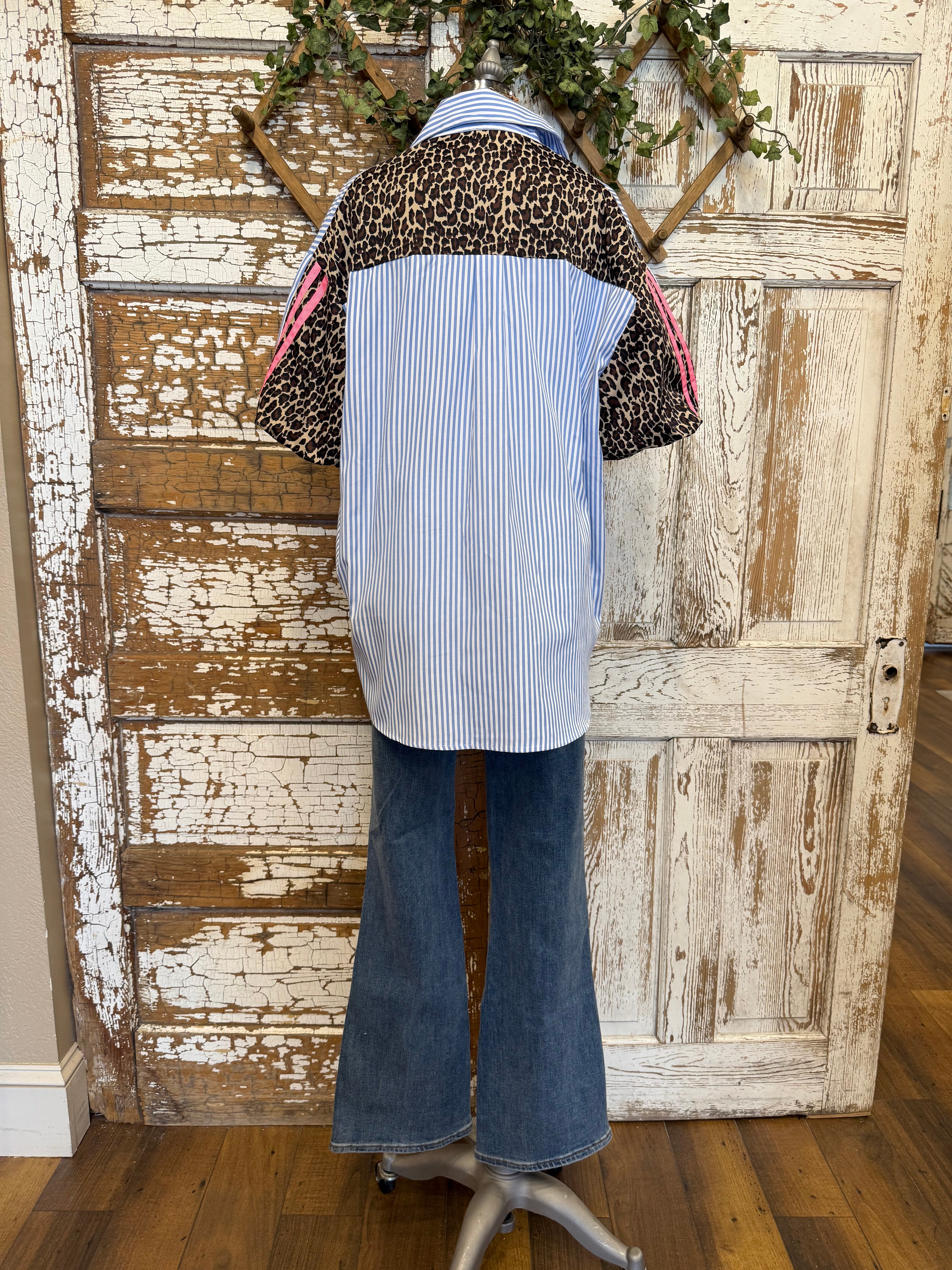 Mannequin wearing a blue striped shirt and dark jeans in Springfield, MO boutique