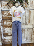Mannequin wearing graphic tee and loungewear leisurewear pants