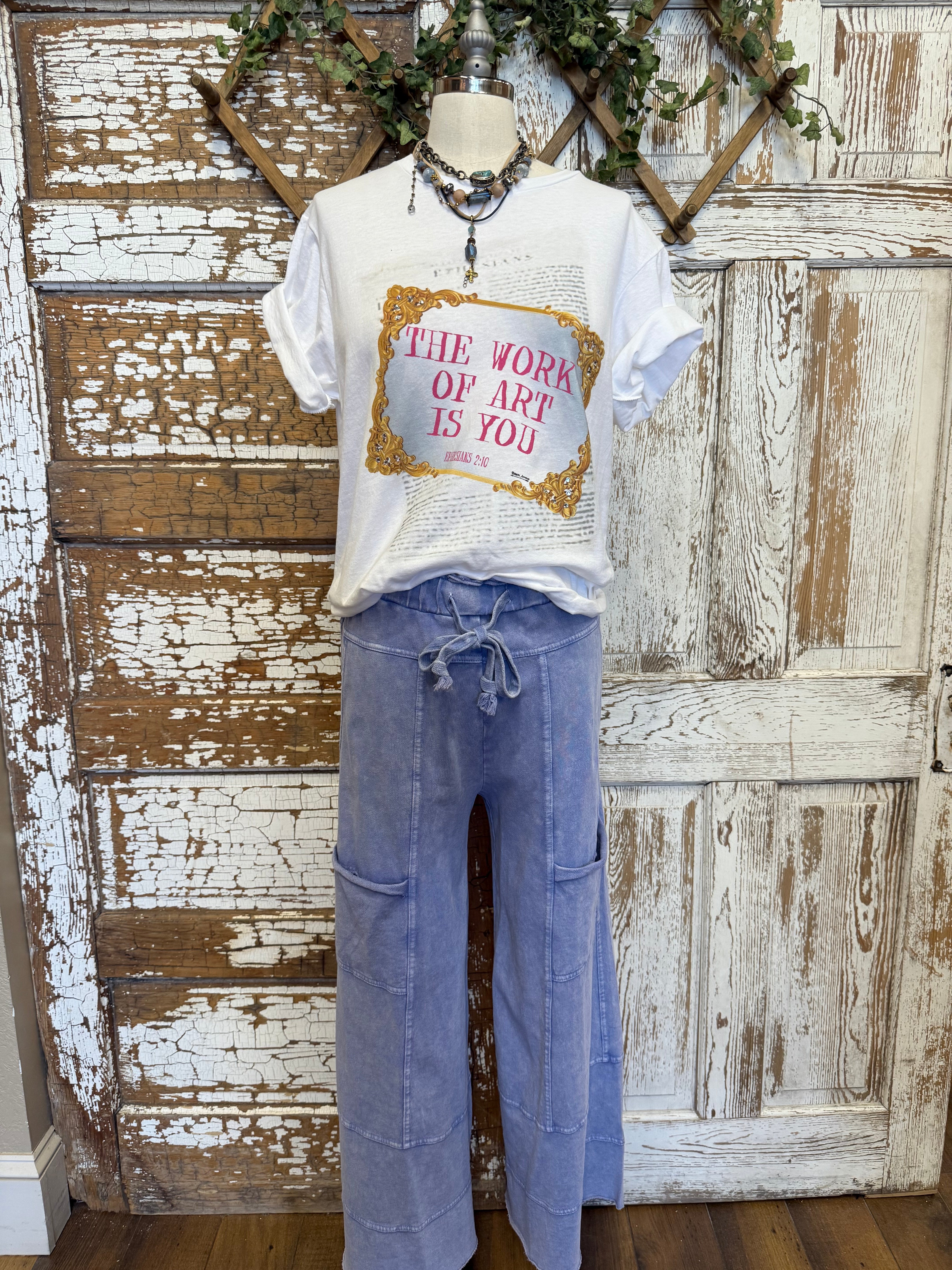Mannequin wearing graphic tee and loungewear leisurewear pants