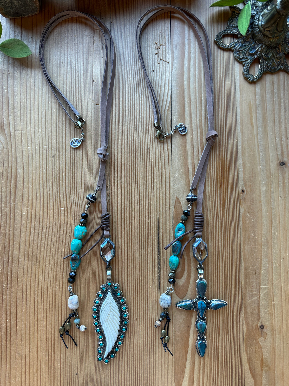 Sacred Ground Drift Necklace in Feather and Cross styles, suede cord with turquoise beading